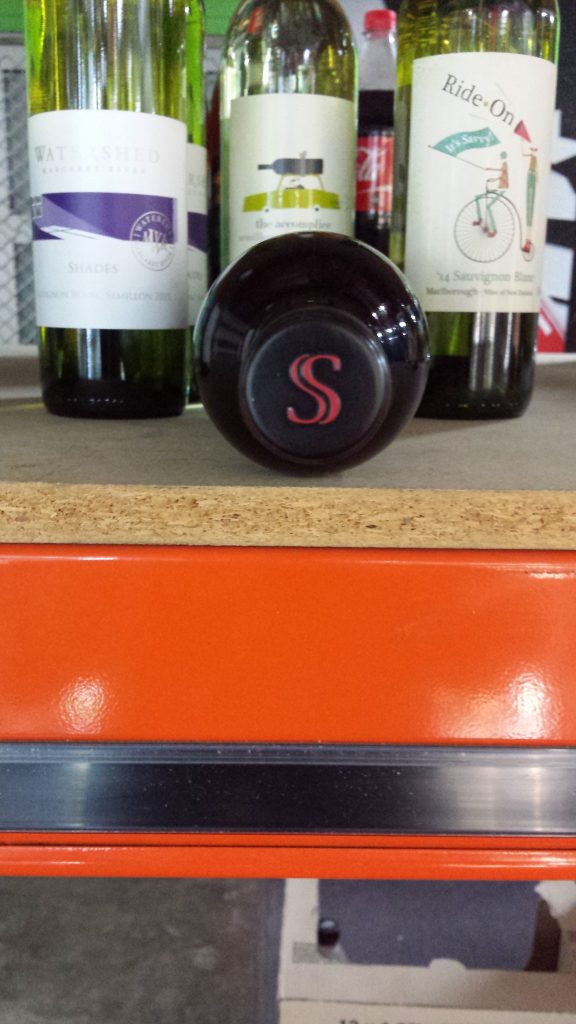 serafino-s-cap-top-of-wine-bottle